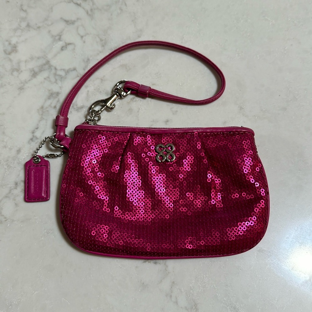 Coach pink sequined wristlet